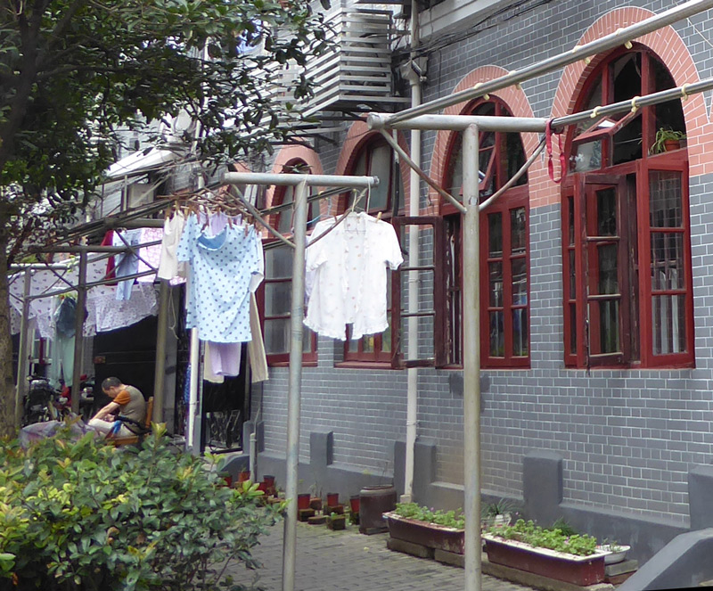 Hanging up laundry in the streets of shanghai